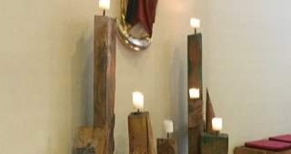 "ave" Candle design with street children, Wood left over from kindergarten construction Gera-Lusan